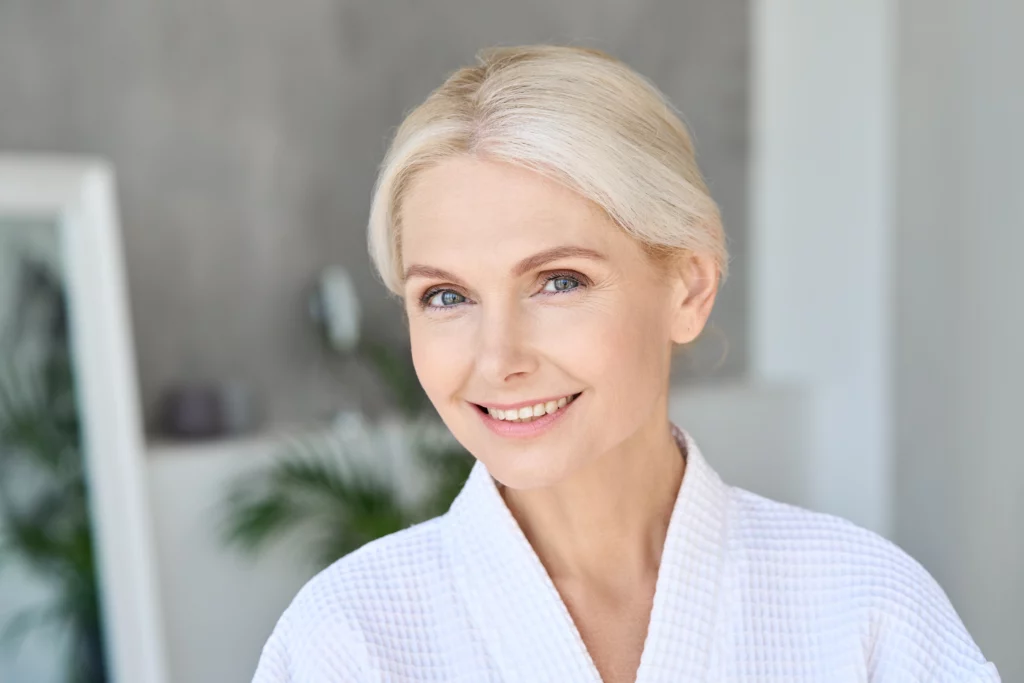 portrait of smiling mid age woman looking at camer 2026 03 18 16 03 37 utc