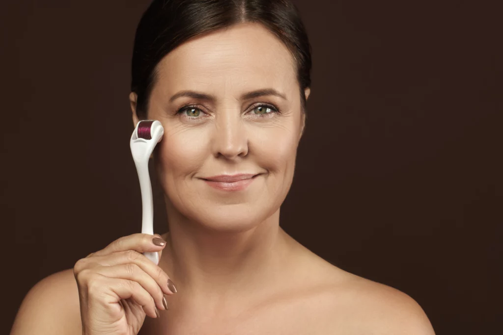 woman holding beauty roller for facial treatment 2026 03 09 08 45 38 utc